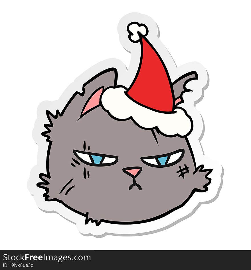 hand drawn sticker cartoon of a tough cat face wearing santa hat