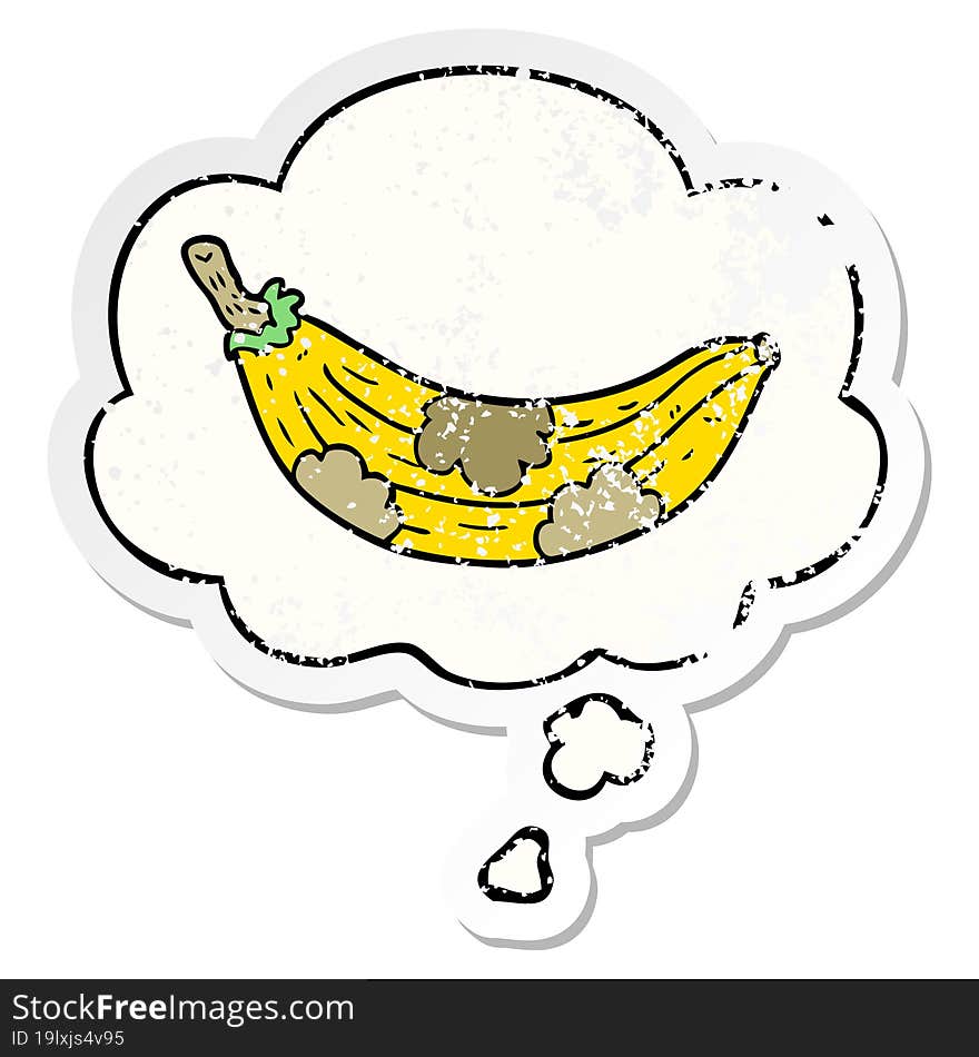 cartoon old banana and thought bubble as a distressed worn sticker