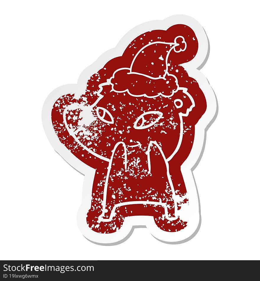 cute cartoon distressed sticker of a bear wearing santa hat