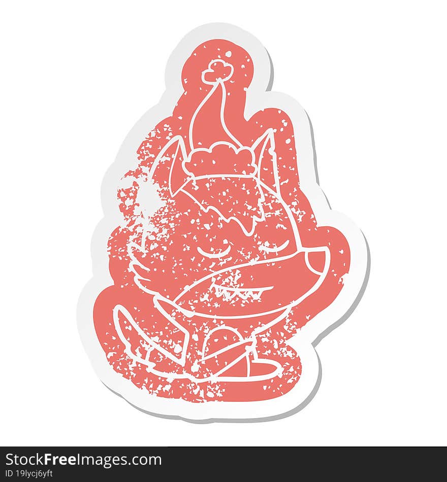 friendly cartoon distressed sticker of a wolf sitting wearing santa hat