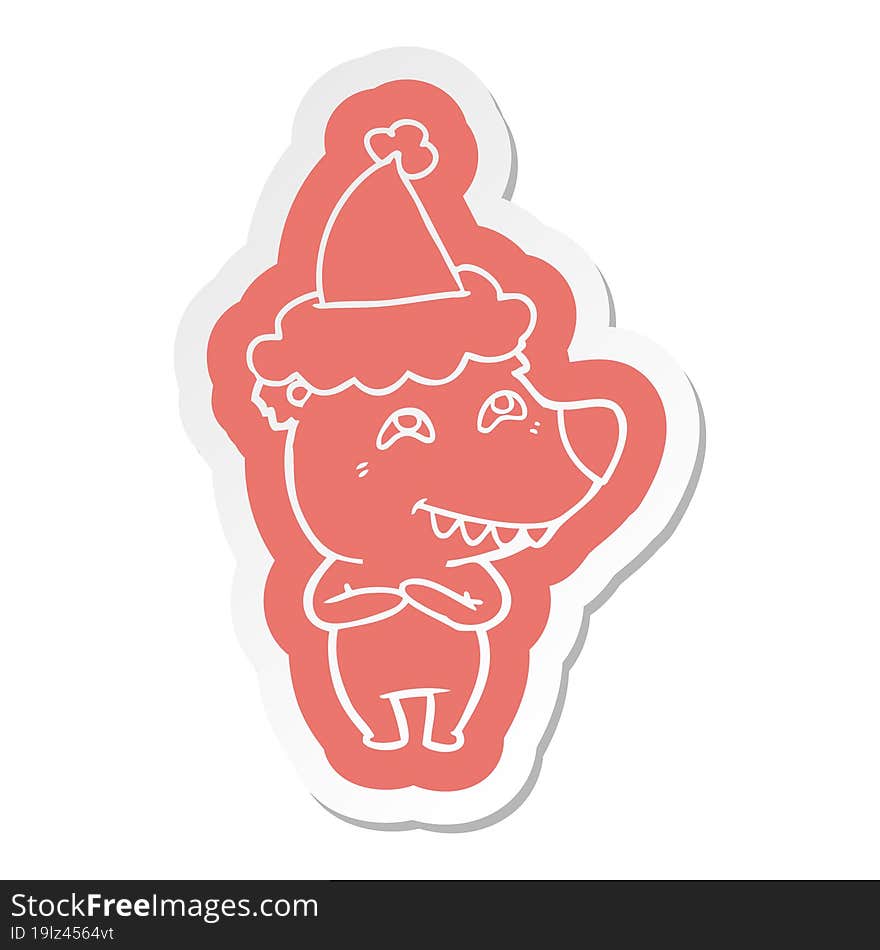 cartoon  sticker of a bear showing teeth wearing santa hat