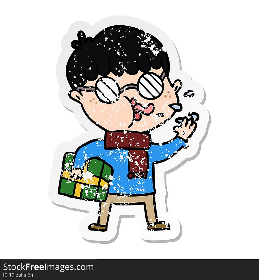 distressed sticker of a cartoon boy wearing spectacles with christmas gift