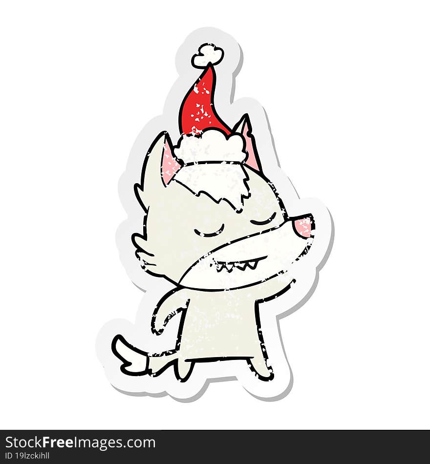 friendly distressed sticker cartoon of a wolf wearing santa hat