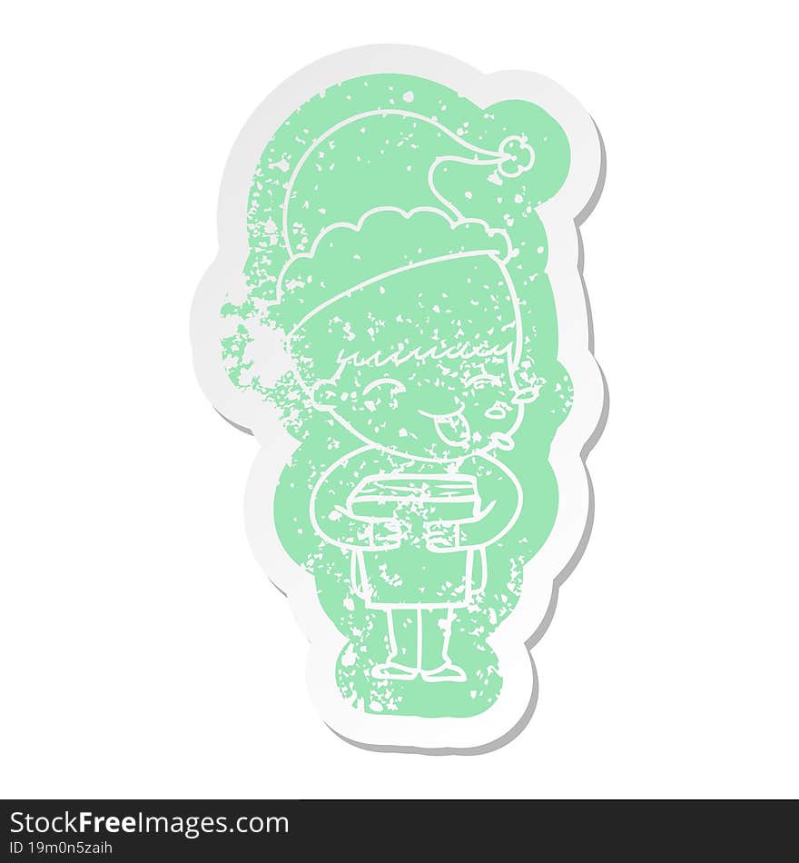 quirky cartoon distressed sticker of a boy wearing santa hat