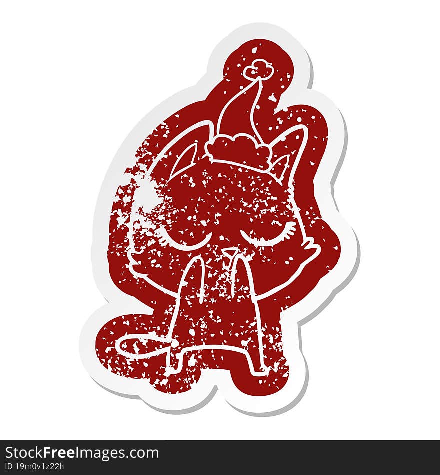 Calm Cartoon Distressed Sticker Of A Cat Wearing Santa Hat