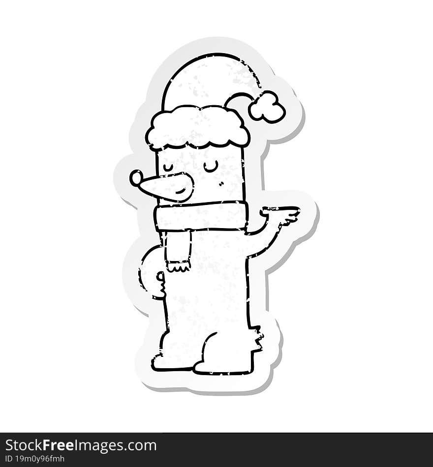 distressed sticker of a cartoon bear wearing christmas hat