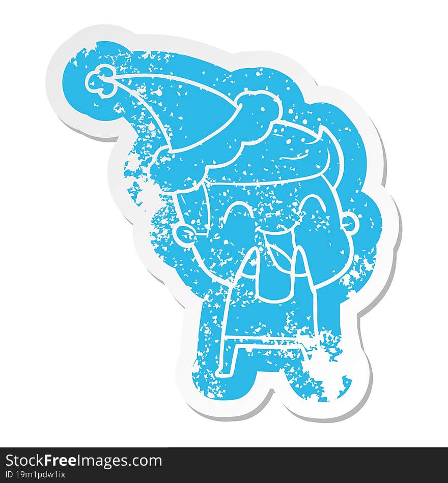 quirky cartoon distressed sticker of a man laughing wearing santa hat