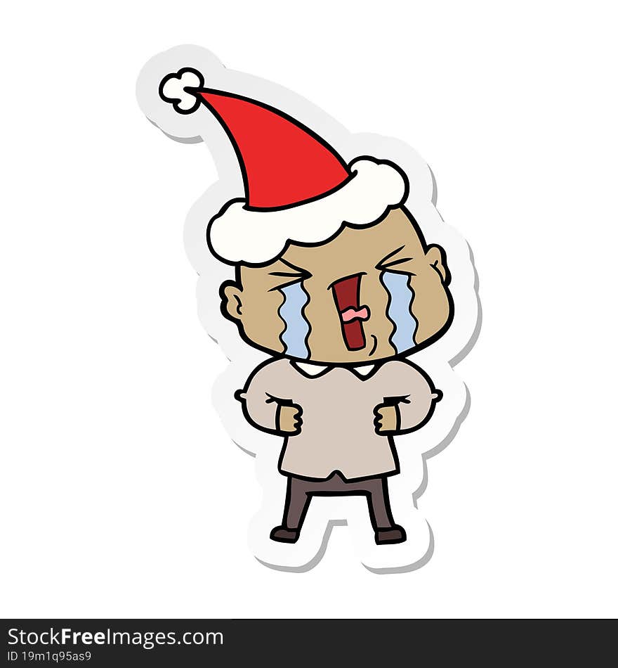 sticker cartoon of a crying bald man wearing santa hat