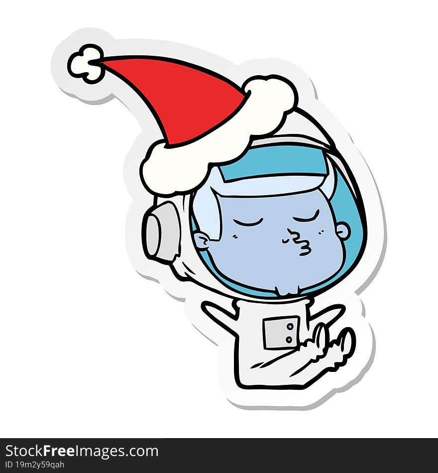 sticker cartoon of a confident astronaut wearing santa hat