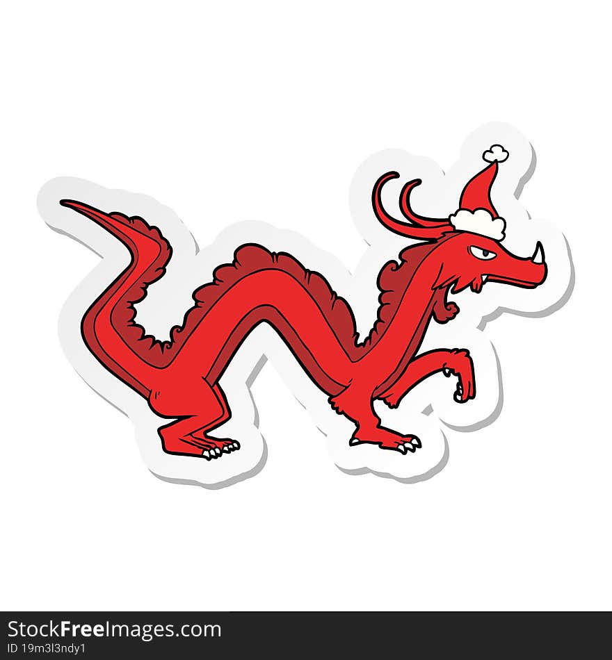 sticker cartoon of a dragon wearing santa hat