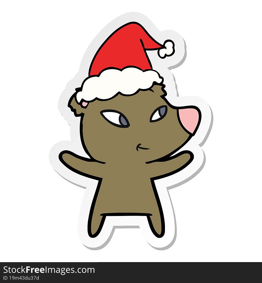 cute sticker cartoon of a bear wearing santa hat