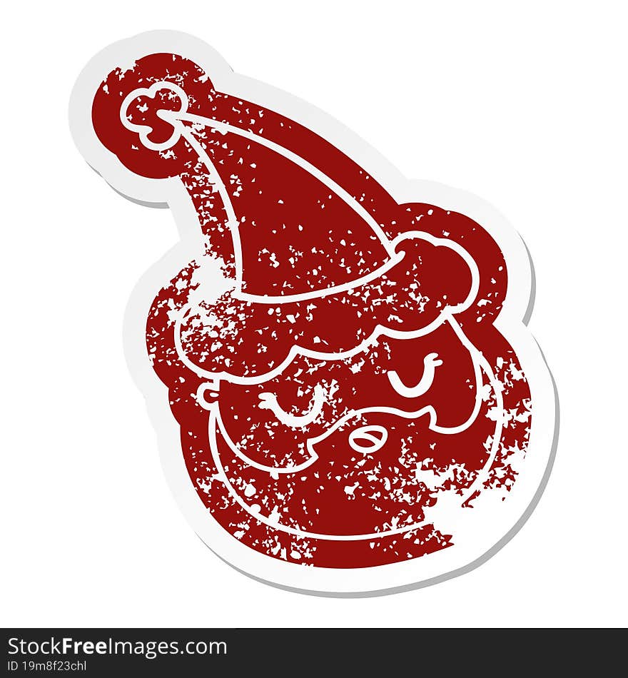 cartoon distressed sticker of a male face with beard wearing santa hat