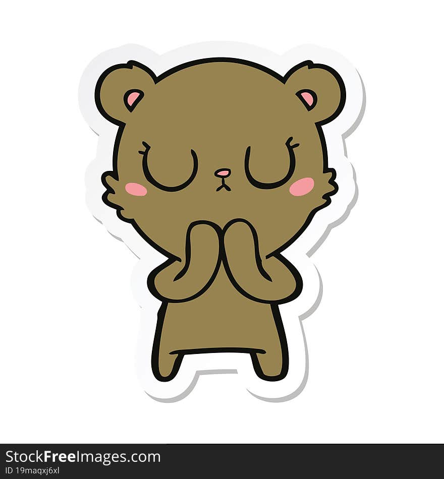 sticker of a peaceful cartoon bear cub