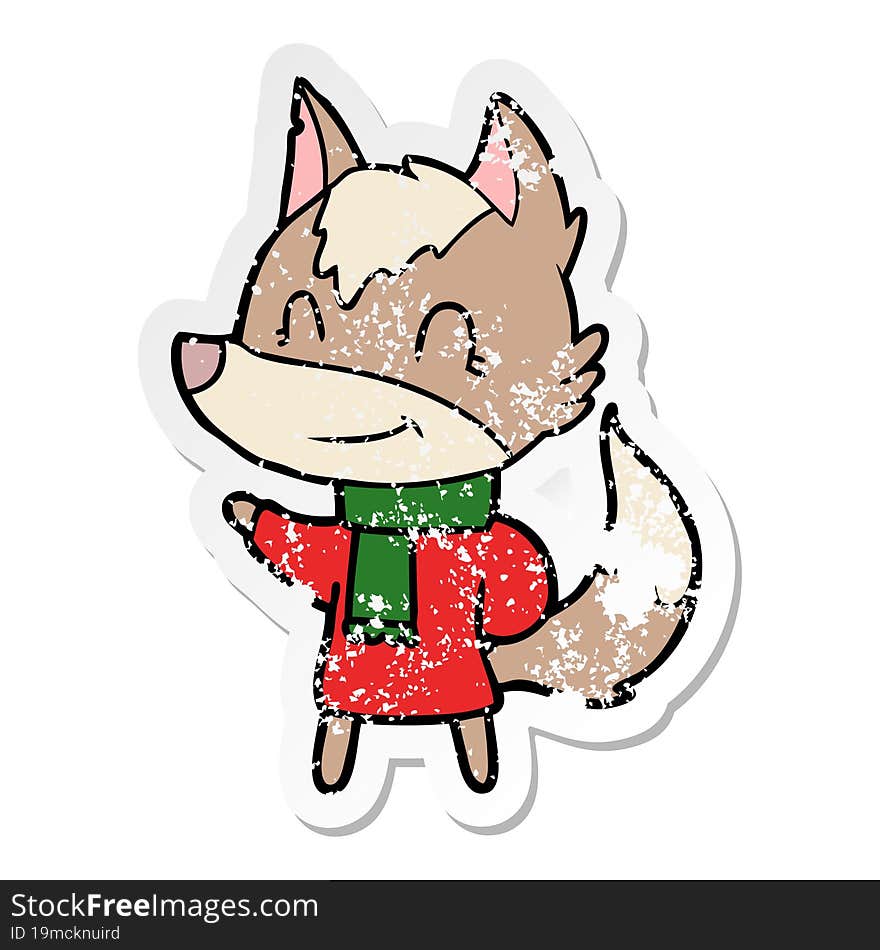 distressed sticker of a friendly cartoon wolf in winter clothes