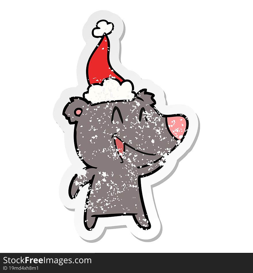 laughing bear hand drawn distressed sticker cartoon of a wearing santa hat. laughing bear hand drawn distressed sticker cartoon of a wearing santa hat