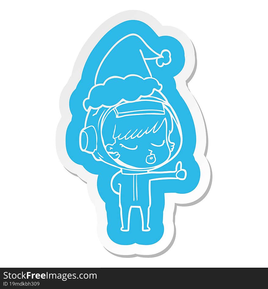 quirky cartoon  sticker of a pretty astronaut girl giving thumbs up wearing santa hat