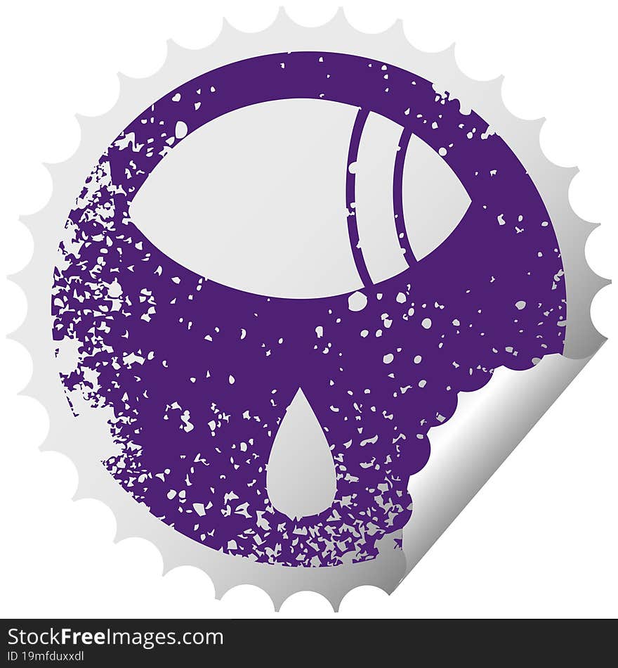 distressed circular peeling sticker symbol of a crying eye looking to one side