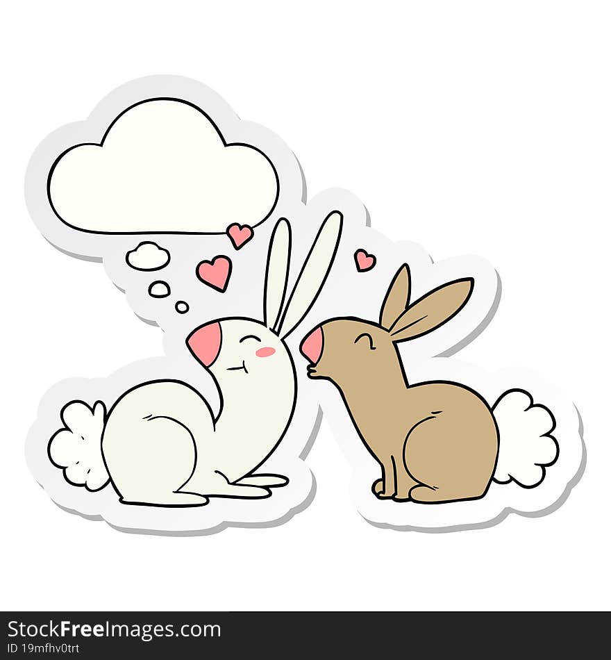 cartoon rabbits in love with thought bubble as a printed sticker