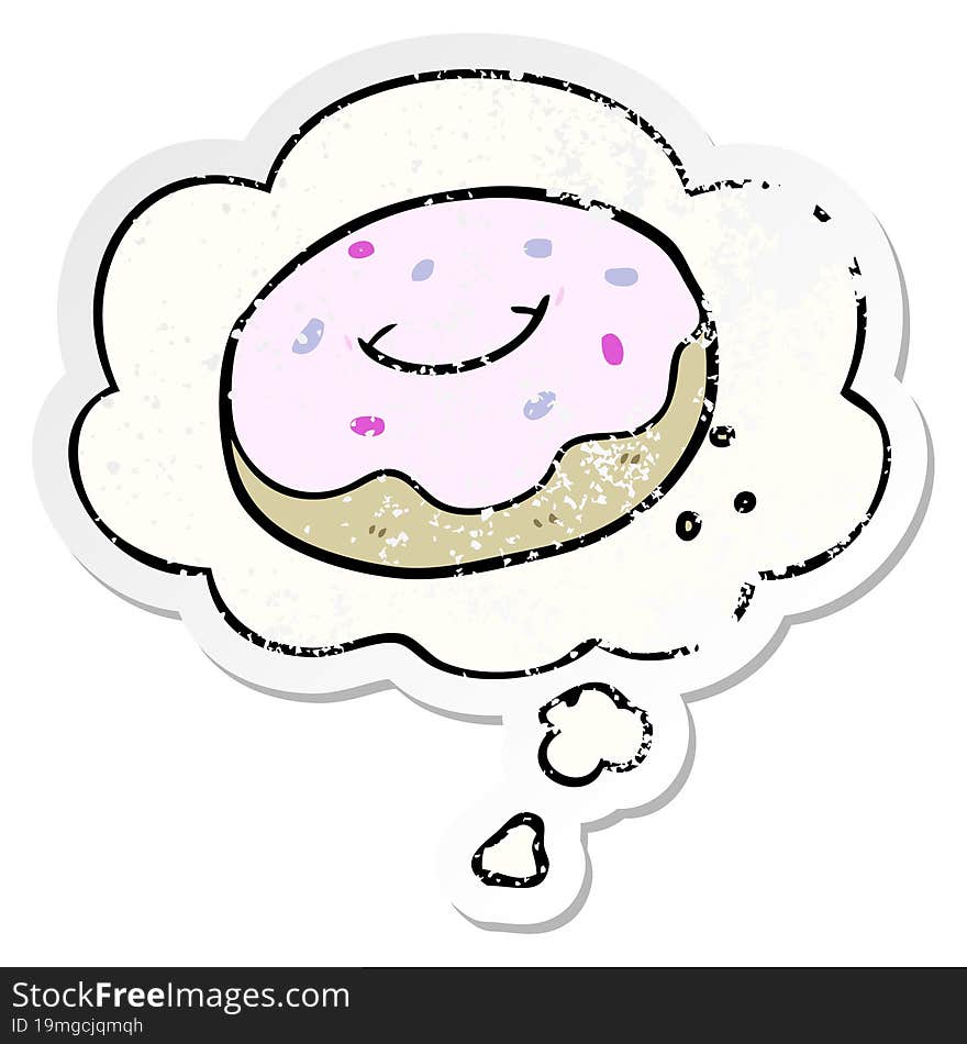 cartoon donut and thought bubble as a distressed worn sticker