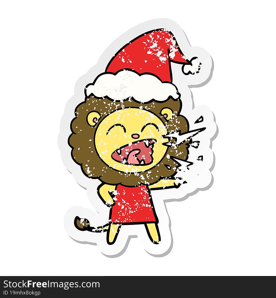 distressed sticker cartoon of a roaring lion girl wearing santa hat