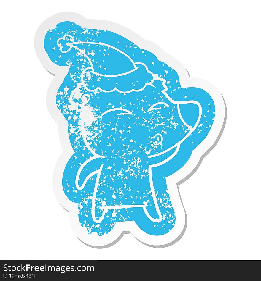 Cartoon Distressed Sticker Of A Whistling Bear Wearing Santa Hat