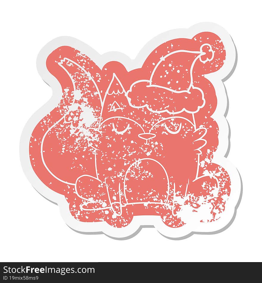 quirky cartoon distressed sticker of a fox wearing santa hat