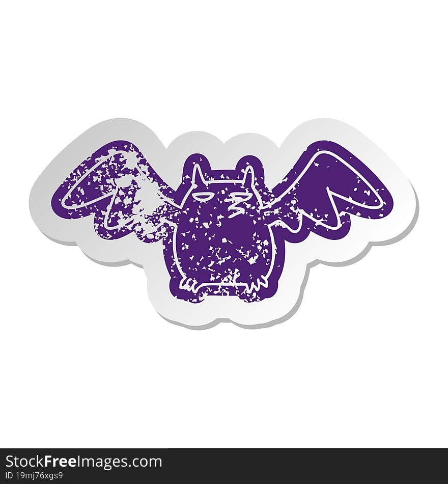 distressed old sticker of a night bat