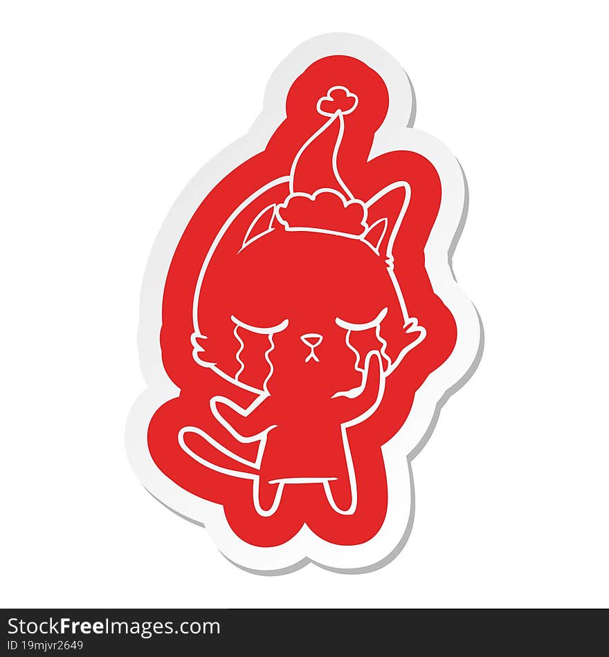 crying cartoon  sticker of a cat wearing santa hat