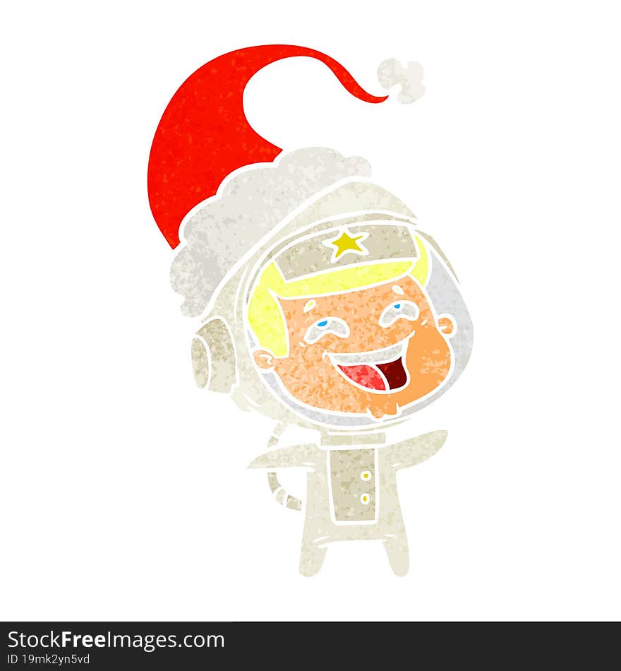 hand drawn retro cartoon of a laughing astronaut wearing santa hat