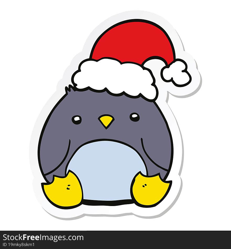 sticker of a cute cartoon penguin wearing christmas hat