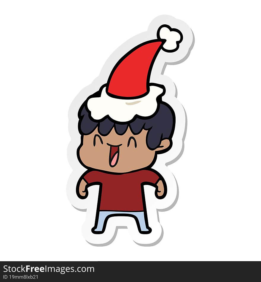 Sticker Cartoon Of A Laughing Boy Wearing Santa Hat