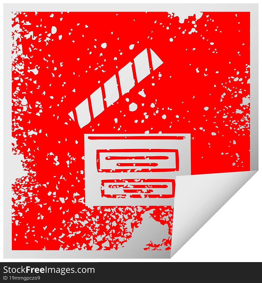 distressed square peeling sticker symbol of a director clapper