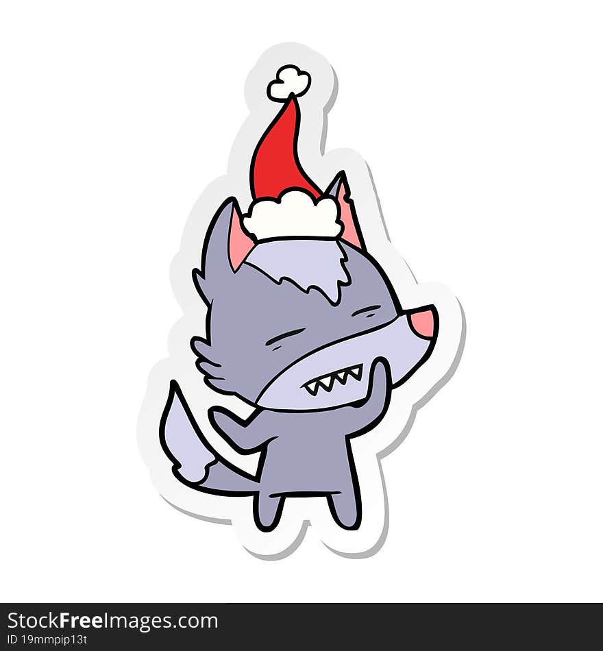 Sticker Cartoon Of A Wolf Showing Teeth Wearing Santa Hat