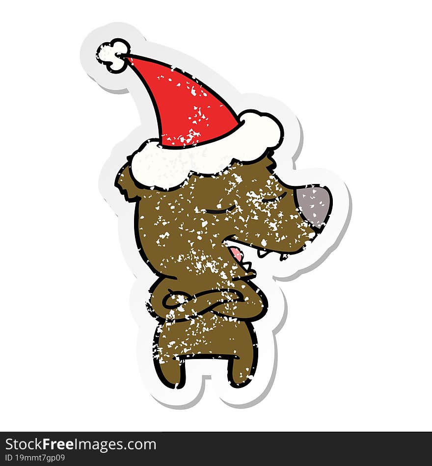 Distressed Sticker Cartoon Of A Bear Wearing Santa Hat