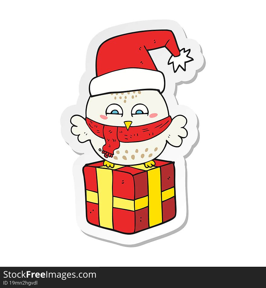 sticker of a cartoon cute christmas owl on gift