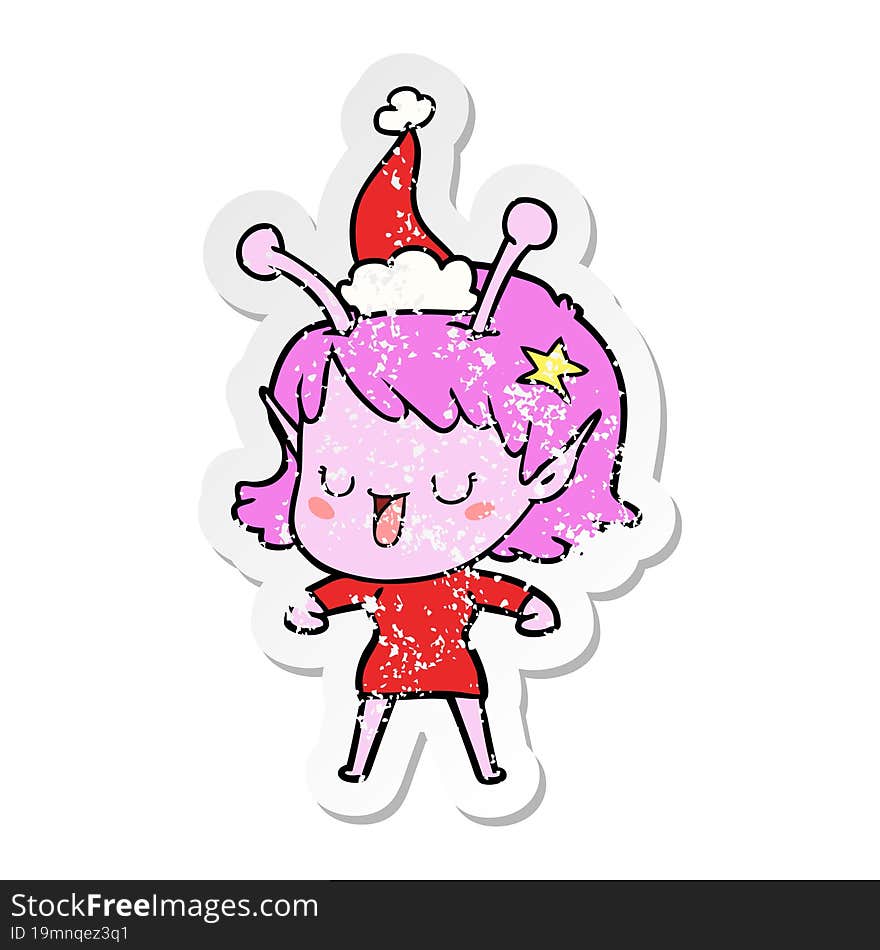 happy alien girl distressed sticker cartoon of a wearing santa hat