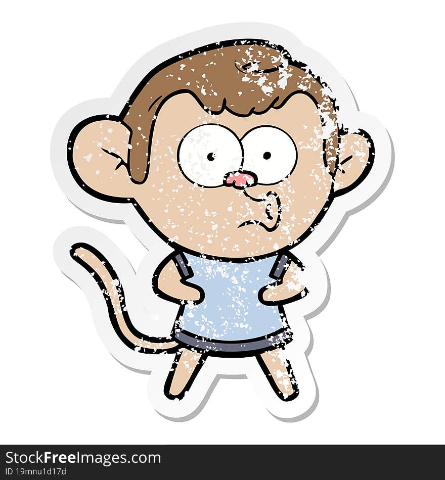 distressed sticker of a cartoon surprised monkey