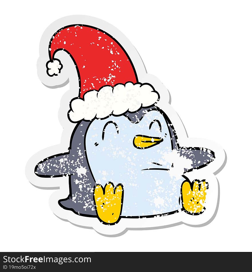 Distressed Sticker Of A Cartoon Penguin Wearing Christmas Hat