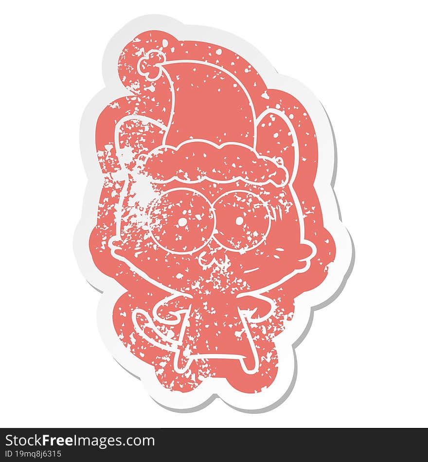 cartoon distressed sticker of a surprised cat wearing santa hat