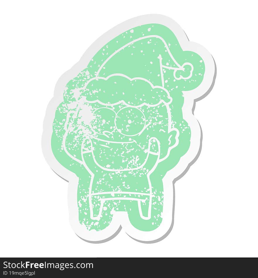 cartoon distressed sticker of a bald man staring wearing santa hat