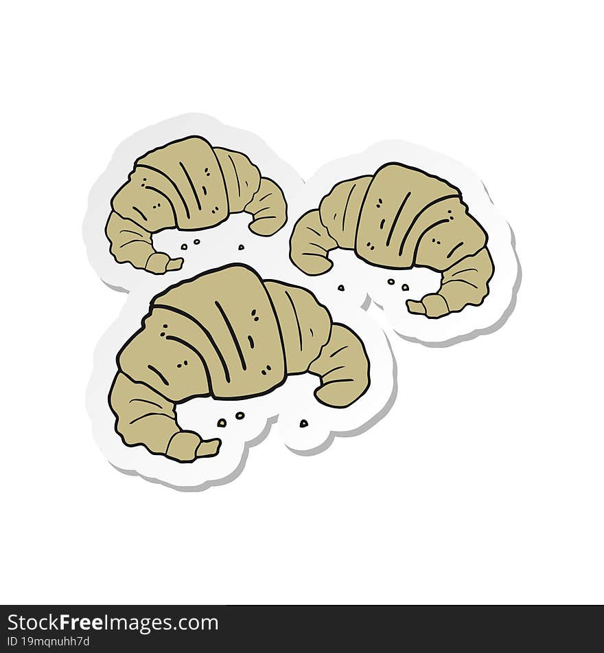 sticker of a cartoon croissants