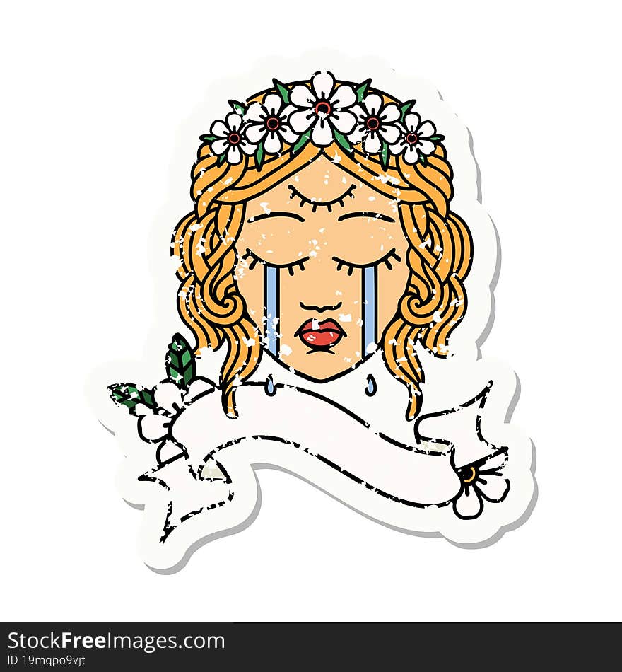 worn old sticker with banner of female face with third eye and crown of flowers cyring. worn old sticker with banner of female face with third eye and crown of flowers cyring