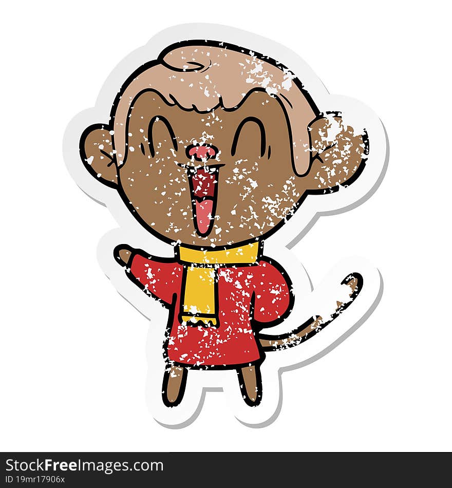 distressed sticker of a cartoon laughing monkey