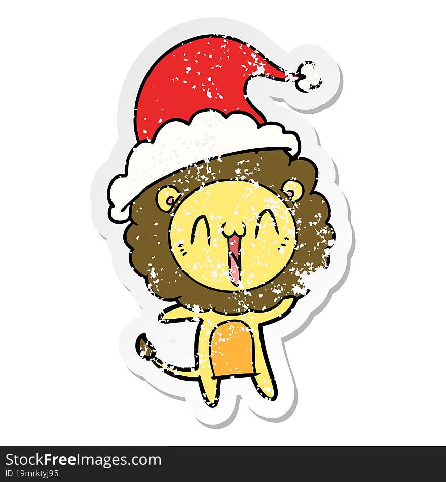 happy distressed sticker cartoon of a lion wearing santa hat