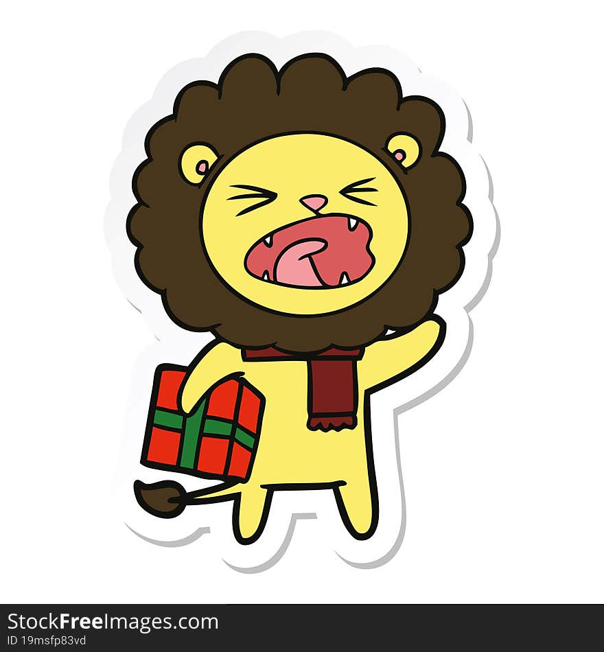 sticker of a cartoon lion with christmas present