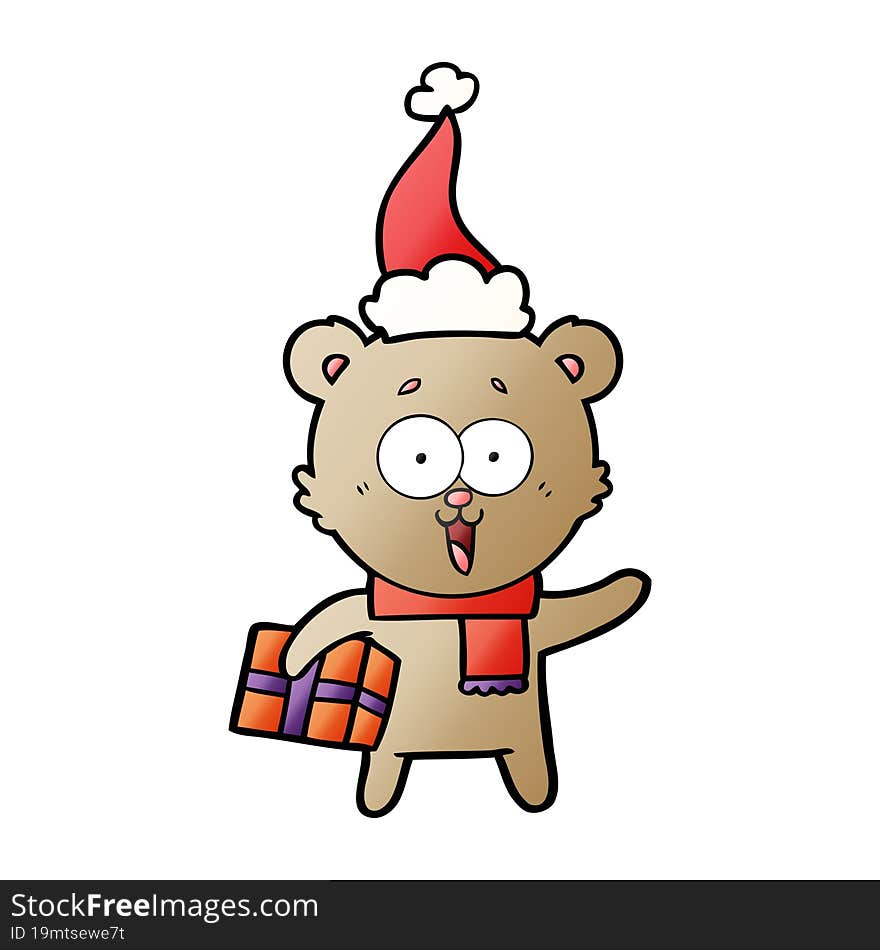 laughing teddy  bear with christmas present wearing santa hat