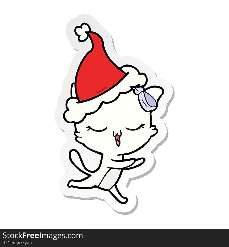 sticker cartoon of a cat with bow on head wearing santa hat