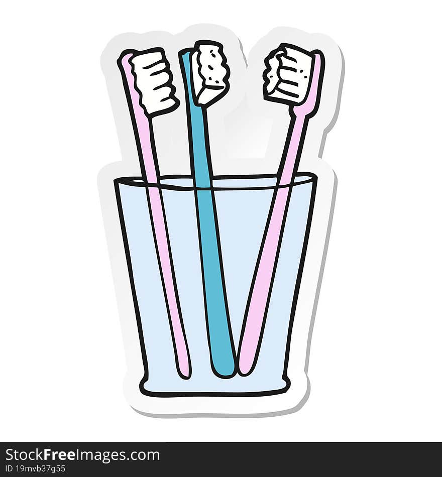 sticker of a cartoon glass and toothbrushes