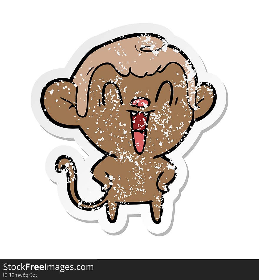 distressed sticker of a cartoon laughing monkey