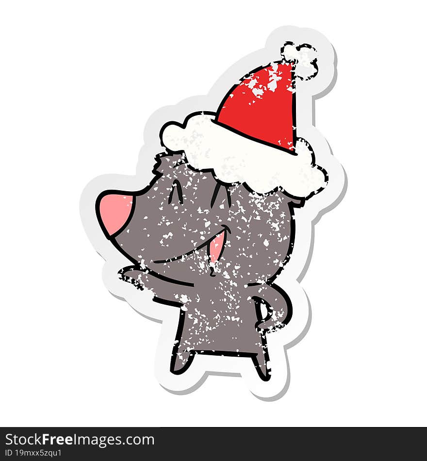 laughing bear hand drawn distressed sticker cartoon of a wearing santa hat. laughing bear hand drawn distressed sticker cartoon of a wearing santa hat